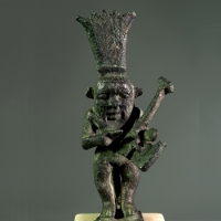 A Bronze Statuette of the God Bes Playing the Kithara