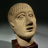 An Etruscan Pottery Head of a Boy